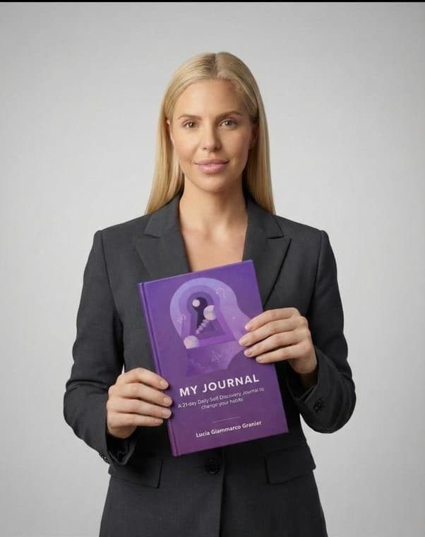 Lucia Giammarco Granier holding the Journal of Self-Discovery